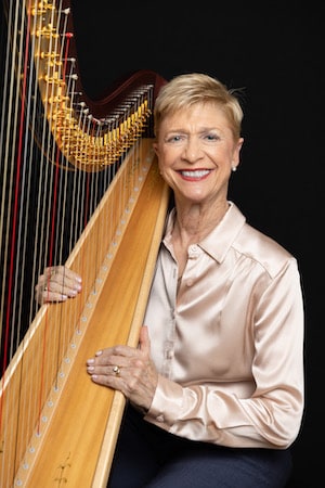 Andrea Donovan playing harp